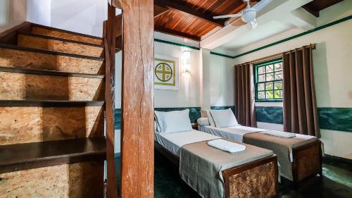 Cama ou camas em um quarto em Pousada Monte Azul