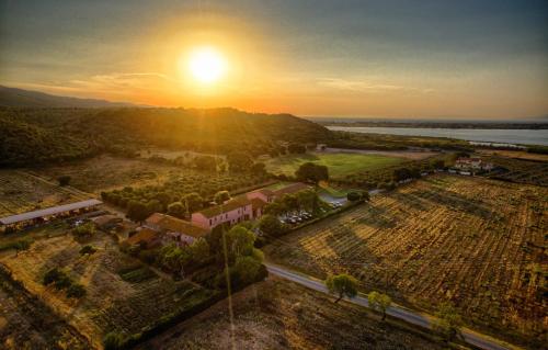 an aerial view of a farm at sunset at Agriturismo Ristorante Monte Argentario in Monte Argentario