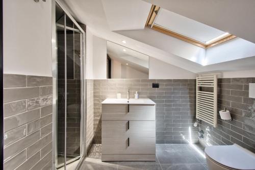 Bilik mandi di 5 MIGLIA APARTMENT la mansarda a Collegno