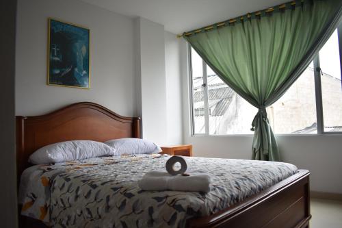 Un pat sau paturi într-o cameră la La Puerta Rota