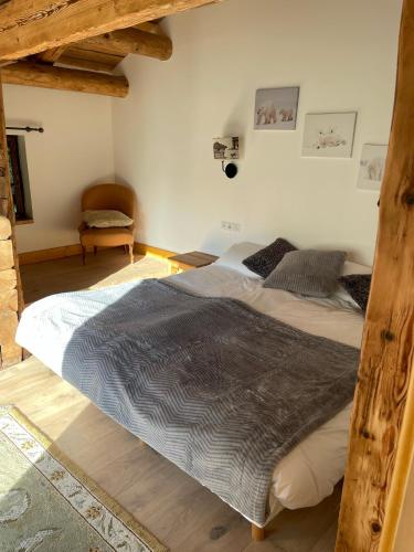 a bedroom with two beds in a room at Chalet Heron in Les Houches