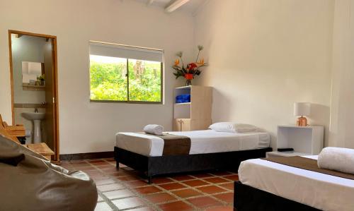 Katil atau katil-katil dalam bilik di Hotel CSI Llanogrande
