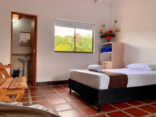 Cama o camas de una habitación en Hotel CSI Llanogrande