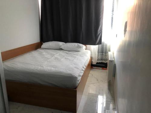 Postel nebo postele na pokoji v ubytování NR1 HOTEL