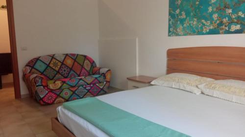 Łóżko lub łóżka w pokoju w obiekcie Astra House relax a 10minuti da Salerno centro