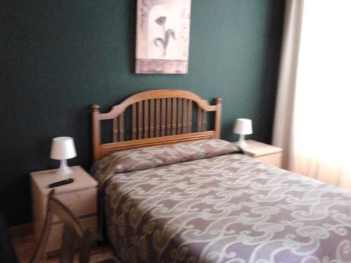 Postel nebo postele na pokoji v ubytování Hotel Luzon