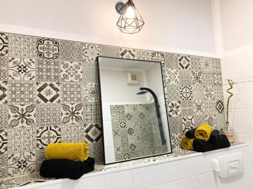 Ванная комната в Lovely City-Apartment*Tiefgarage,Zentrum,BTU*