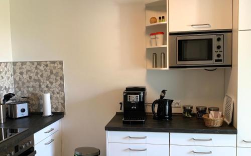 Η κουζίνα ή μικρή κουζίνα στο Apartment nähe Ettlingen - 15 min zur Messe Karlsruhe