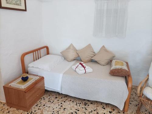 Een bed of bedden in een kamer bij Trullo Libellula