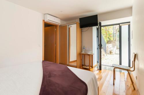 Voodi või voodid majutusasutuse DouroParadise toas