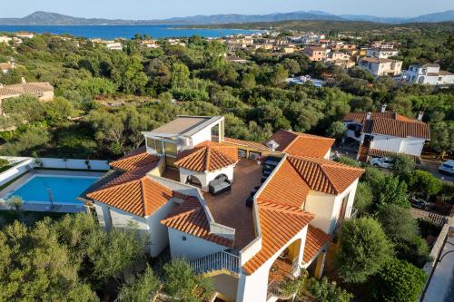 an aerial view of a house with a swimming pool at Antica Isola in Olbia