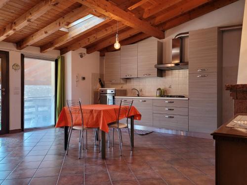 A kitchen or kitchenette at Il nido in montagna Mountain Lake Iseo Hospitality