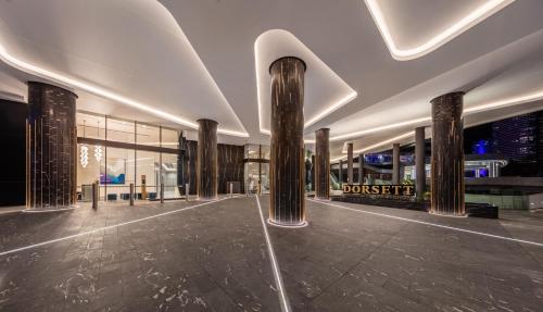 a lobby of a building with columns and a building at The Star Residences - Gold Coast in Gold Coast