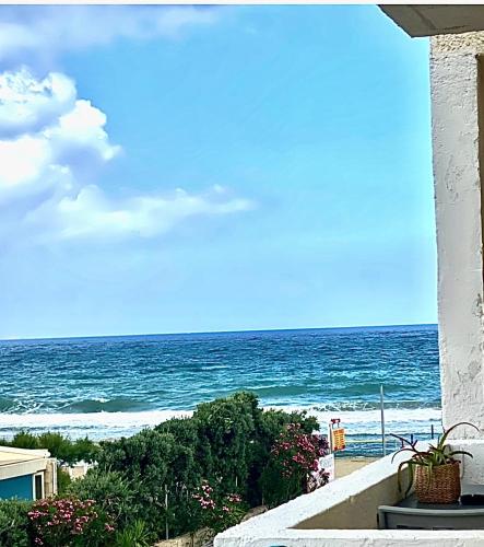 a view of the ocean from a balcony at Mikes on the beach in Hersonissos