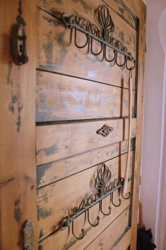 an old wooden door in a room at Lovely Nest near Budapest in Dunakeszi