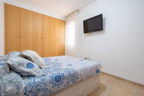 Кровать или кровати в номере Villa Manoli