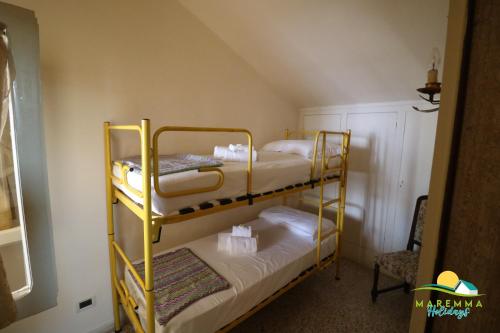 Posteľ alebo postele v izbe v ubytovaní Maremma Holidays -Mentana 2