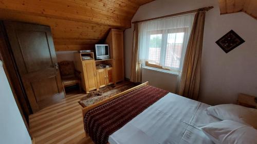 Postel nebo postele na pokoji v ubytování Casa Darius