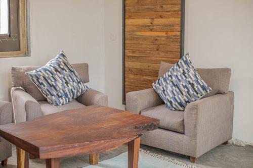 Zona de estar de Adrift River Club