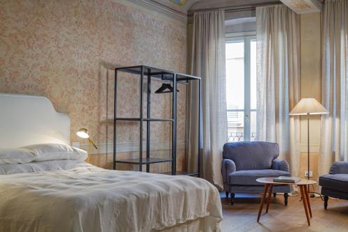 Кровать или кровати в номере Palazzo Glori 6