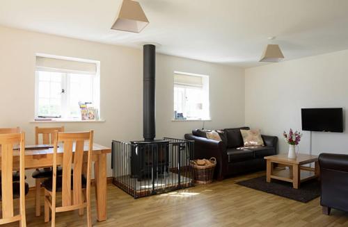 Et tv og/eller underholdning på Mill Lane Farm Holiday Cottages