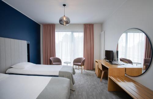 Cama o camas de una habitación en Wasa Resort Hotel, Apartments & SPA