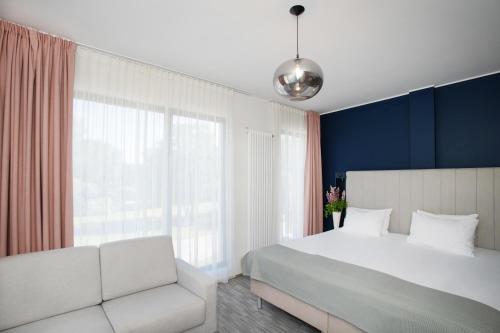 Cama o camas de una habitación en Wasa Resort Hotel, Apartments & SPA