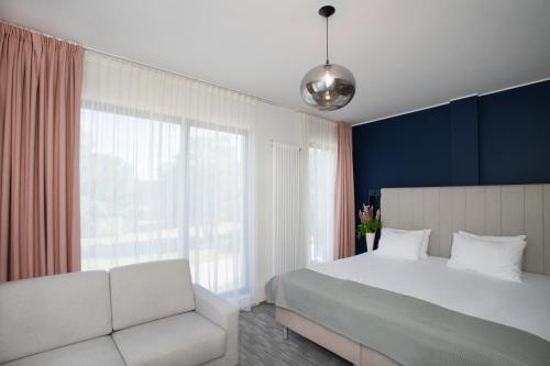 Cama o camas de una habitación en Wasa Resort Hotel, Apartments & SPA