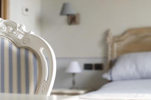 Ένα ή περισσότερα κρεβάτια σε δωμάτιο στο La Vedetta Bed and Breakfast