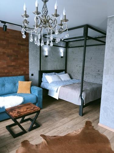 Krevet ili kreveti na kat u jedinici u objektu Дизайнерская квартира в ста метрах от городского парка