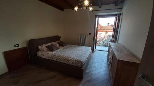 A bed or beds in a room at La maison du château