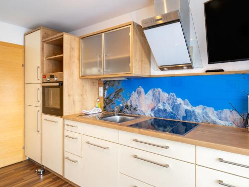 Kuchyň nebo kuchyňský kout v ubytování Apartment Rupertus-3 by Interhome