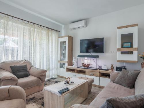 Et tv og/eller underholdning på Holiday Home Ruza by Interhome