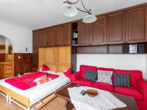 Säng eller sängar i ett rum på Apartment Dachstein-1 by Interhome