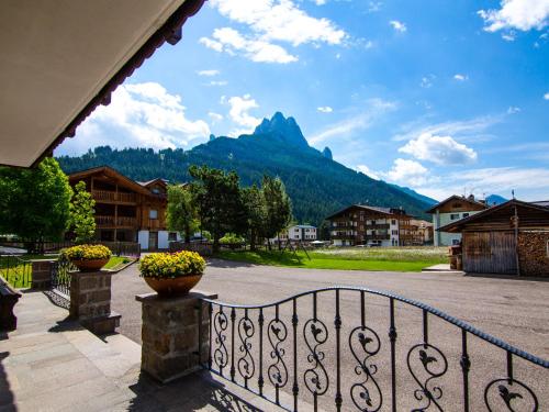 a balcony with a view of a mountain at Apartment Cincelli - Marmolada by Interhome in Pozza di Fassa