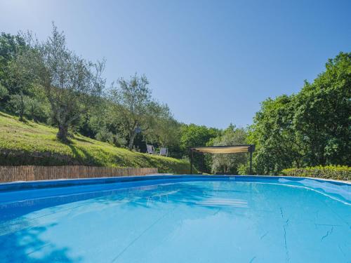 einen Pool mit Pavillon im Hof in der Unterkunft Holiday Home Buratto by Interhome in Monsagrati