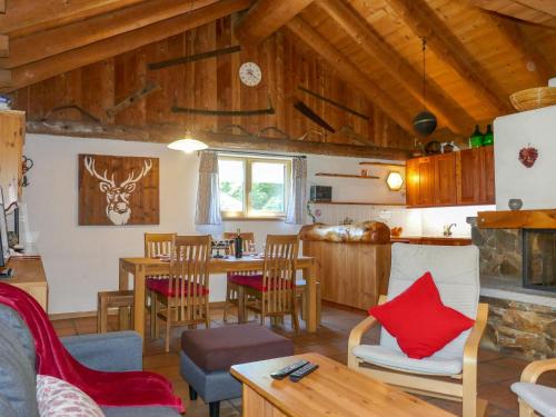 a kitchen and living room with a table and chairs at Holiday Home Rustico Ingrid - MVA338 by Interhome in Semione