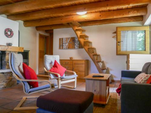 a living room with a couch and a staircase at Holiday Home Rustico Ingrid - MVA338 by Interhome in Semione