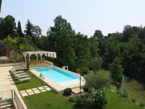 an overhead view of a swimming pool in a yard at Holiday Home Tenuta Margherita by Interhome in Portacomaro