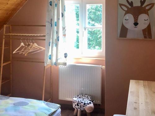 Кровать или кровати в номере Holiday Home Holiday Hill 57 by Interhome