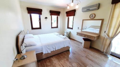 A bed or beds in a room at villa vaha