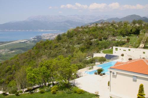 a villa with a view of the water at Villa Eagle Eye Montenegro in Kotor