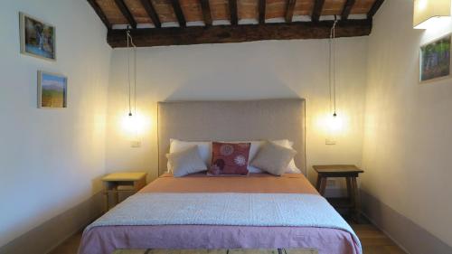 מיטה או מיטות בחדר ב-CASTAGNA DULCIS