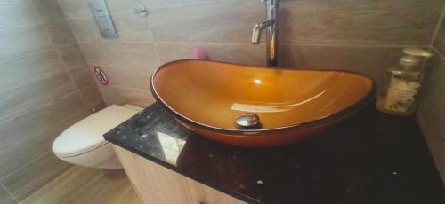 a bathroom with a wooden sink on a counter at House on a Hill with Stunning Views near Troodos in Silikou