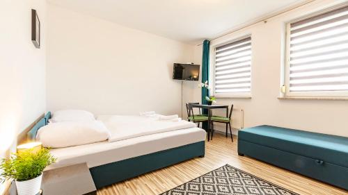Posteľ alebo postele v izbe v ubytovaní VacationClub - Piłsudskiego 10B Apartament 2