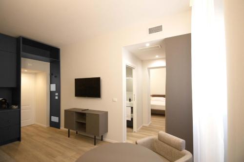 Et tv og/eller underholdning på Palazzo Bellocchi - Suites & Apartments
