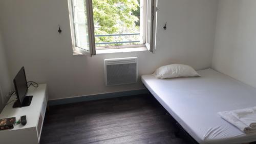 Posteľ alebo postele v izbe v ubytovaní Quimper : studio de 27m2 avec petite chambre a 5 min a pied du centre ville