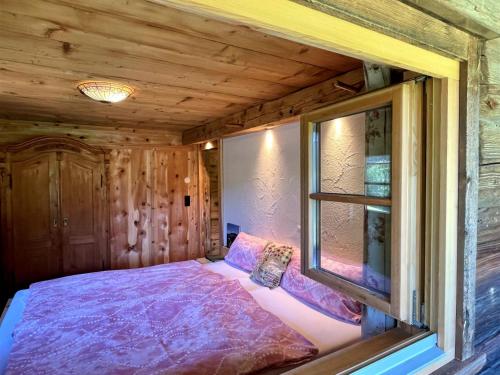 Cama o camas de una habitación en Chalet Troadkasten by Interhome