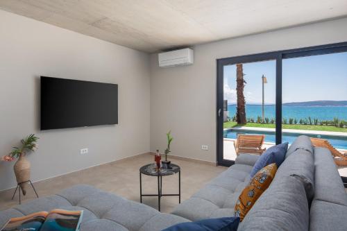 Beachfront Villa Tota with Pool