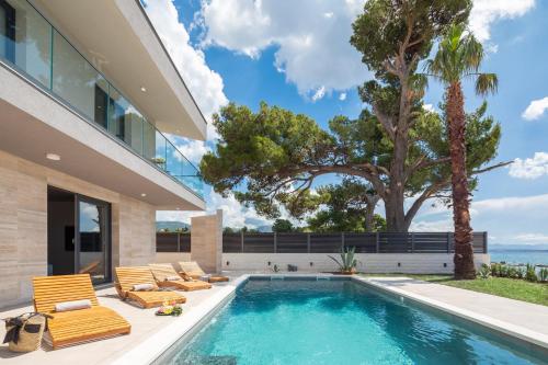 Beachfront Villa Tota with Pool